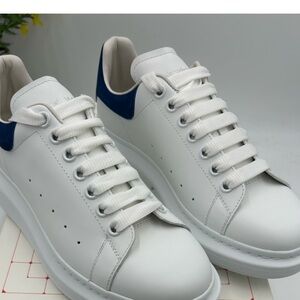 Men’s Alexander McQueen low top leather sneakers . Size 8